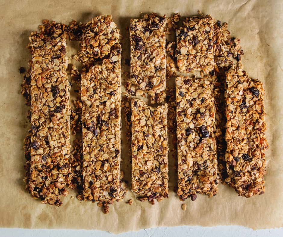 baked granola bars on parchment paper