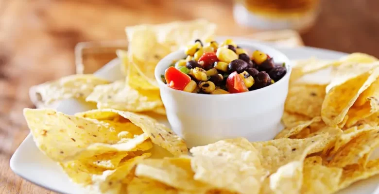 black bean and corn salsa wth chips on plate