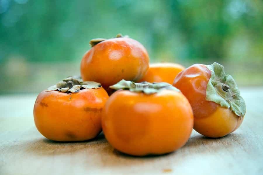stack of ripe fuyu persimmons