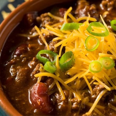 chili con carne and lentils in bowl