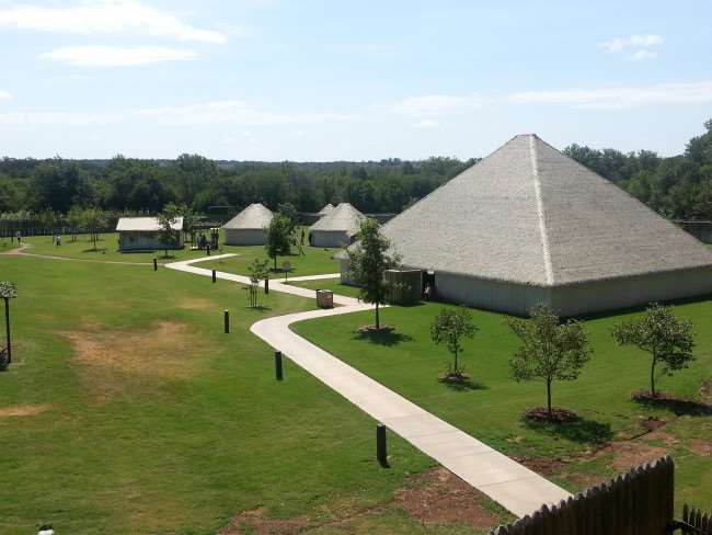 Chickasaw Cultural Center building in a grassy area with a path