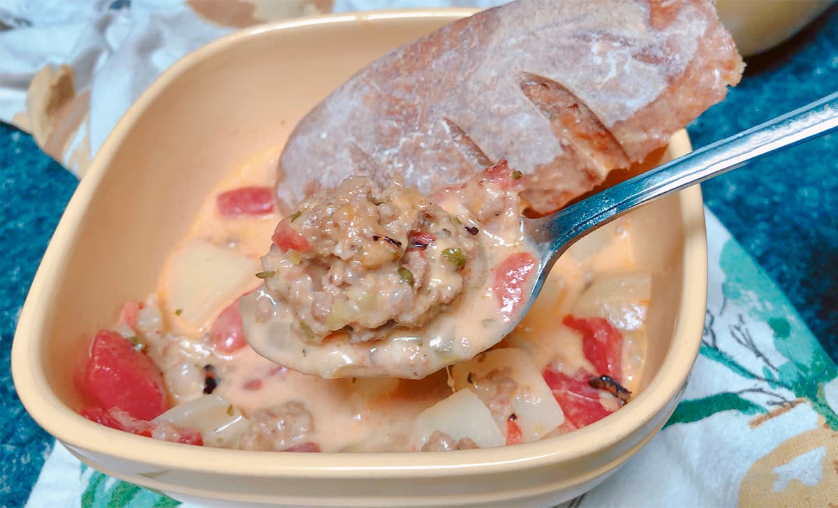 bacon cheeseburger soup on spoon