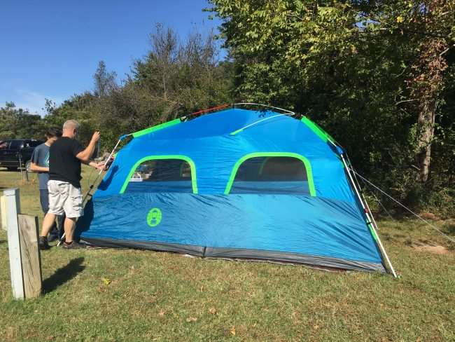 People setting up a tent - Coleman Instant Tent