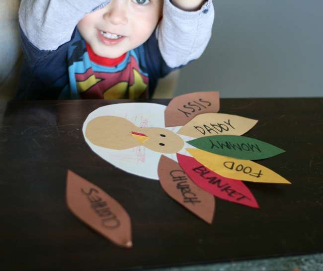 boy making Turkey Craft