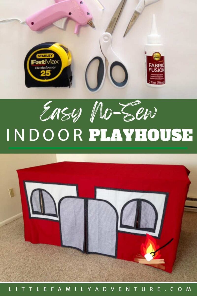 crafting materials such as glue gun, tape measure, scissors and finished product of an indoor playhouse for kids with red material and felt campfire