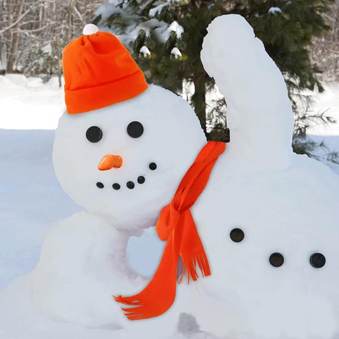 snowman with red hat scarf, charcoal eyes and buttons and a carrot nose