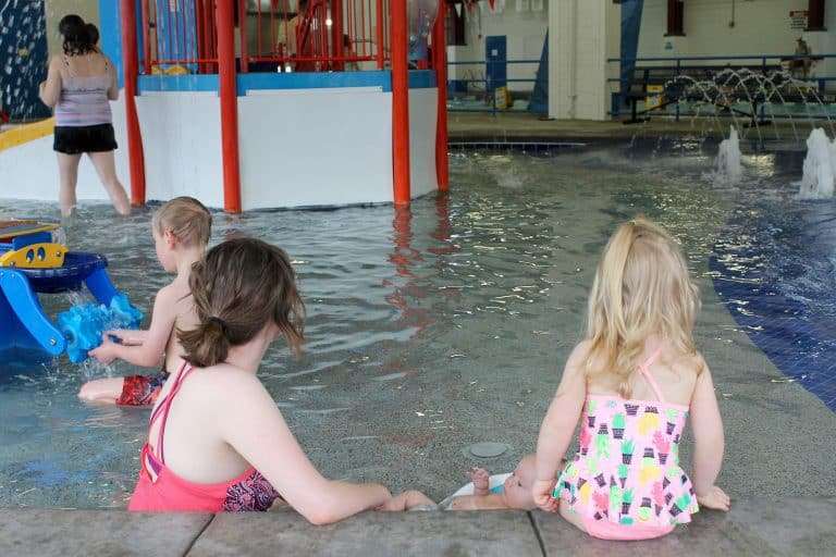 family in hot springs pool