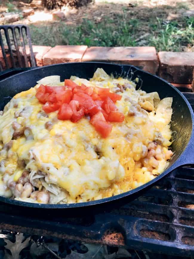 Make anywhere Campfire Nachos with green Chile chicken, beans, and corn.