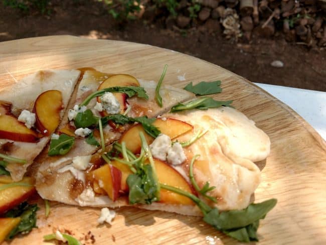 Peach & Honey Pizza made in an outdoor CampMaid Dutch Oven