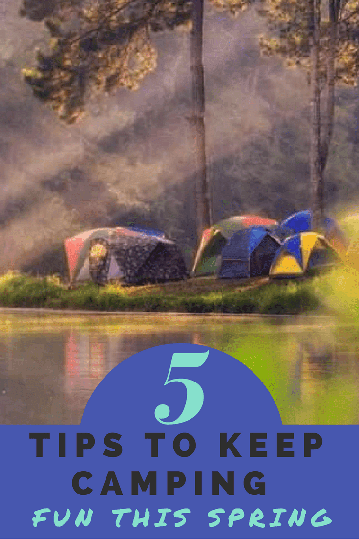 Tents set up by a river - Things to remember to keep spring camping fun with kids