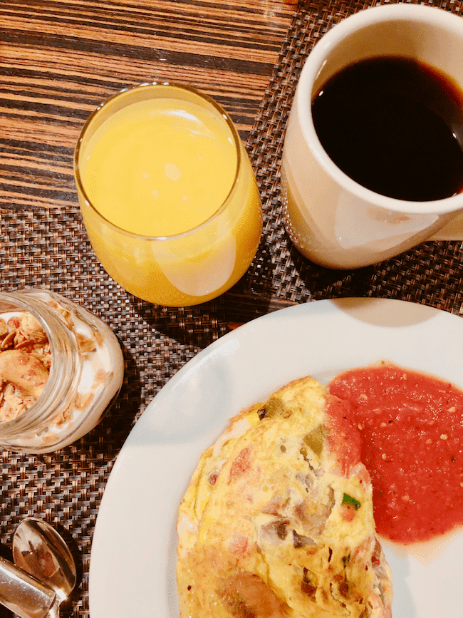 Hearty Breakfast with omelet, yogurt, juice, and coffee from Anaheim Hilton