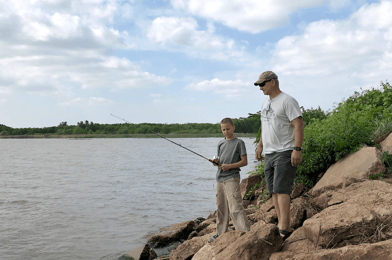 Boy and Dad Fishing - Take dad fishing and then enjoy this Blackened Grilled Catfish