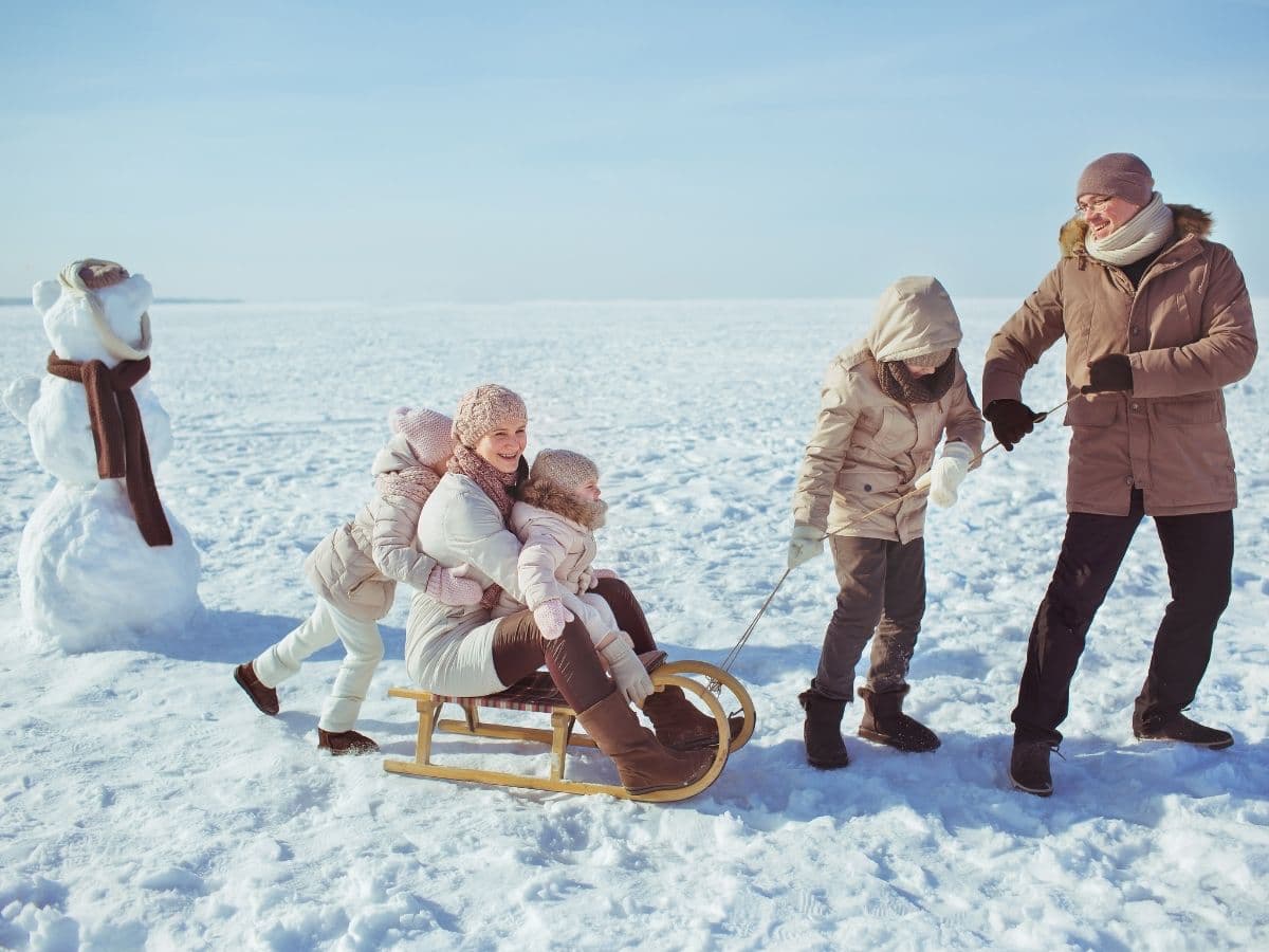 Family Playing Outside Winter