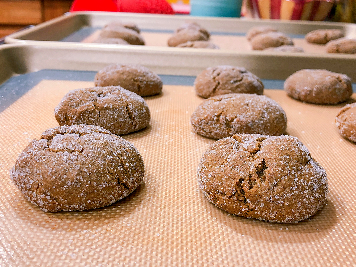 soft molasses crinkle cookies on baking sheet