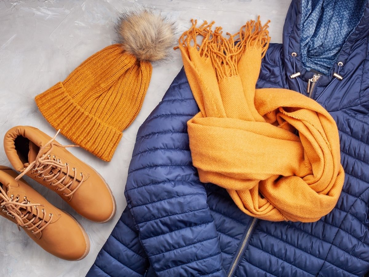 hat, boots, scarf, and winter jacket