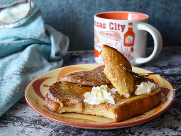 bite of french toast ona plate