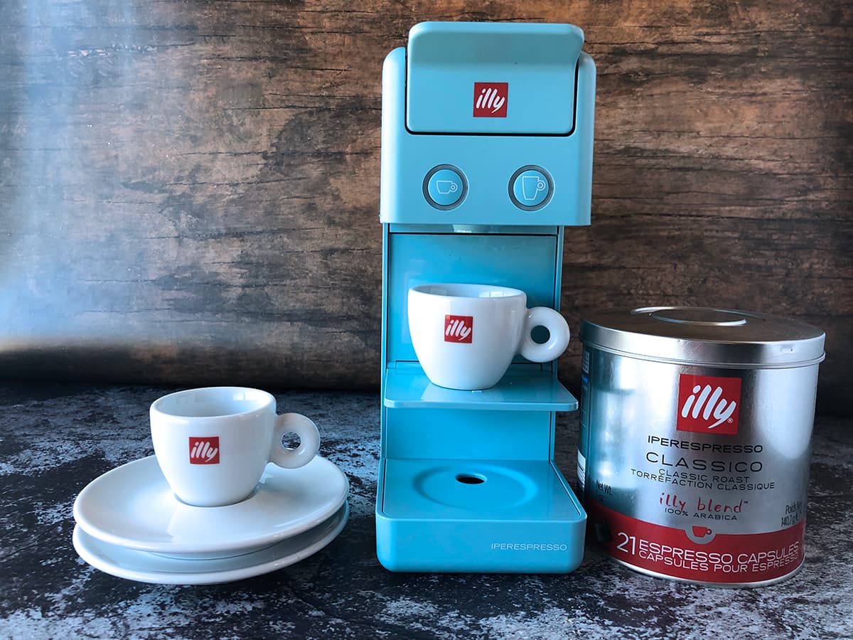 espresso machine, cups, coffee canister