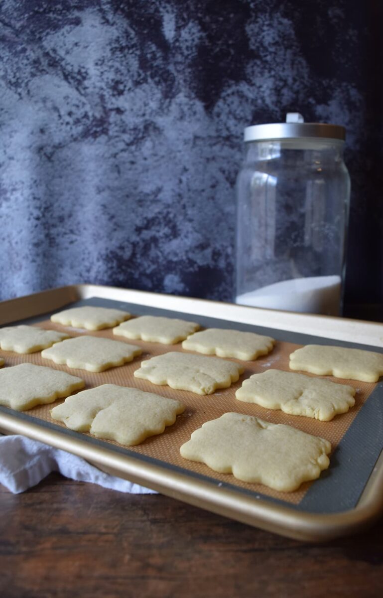 baking sheets with homemade sugar cookies