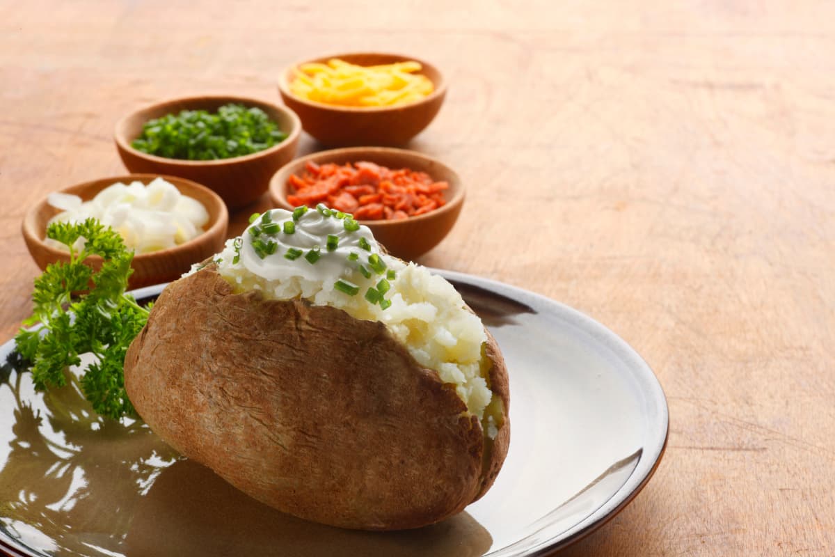 20 Toppings Every Baked Potato Bar Needs