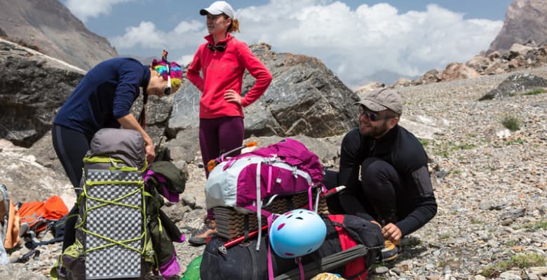 backpacking group checking gear