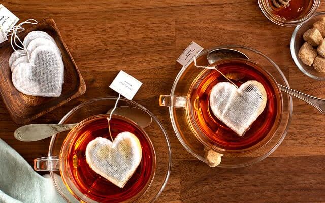 heart shaped tea bags in cups