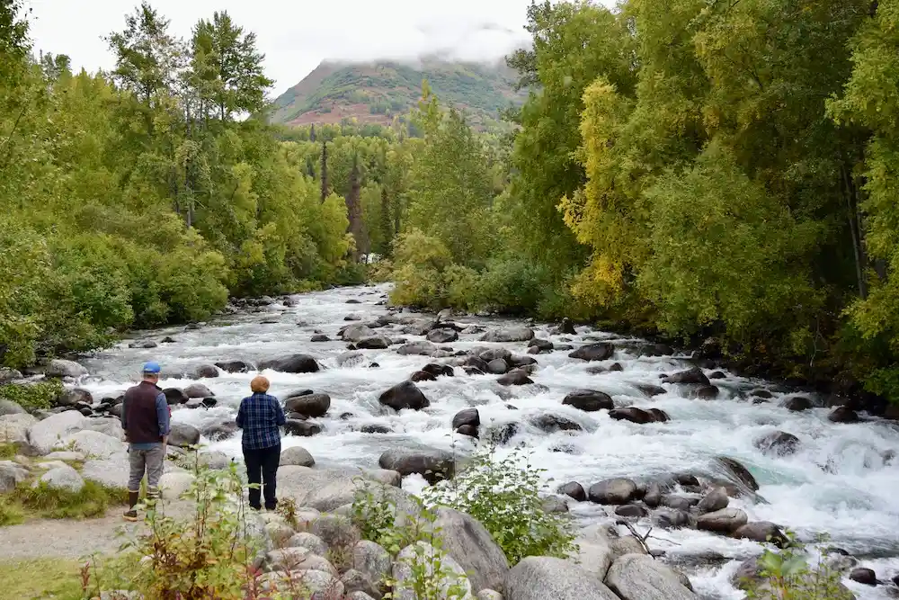 Little Susitna River with couple looking at it