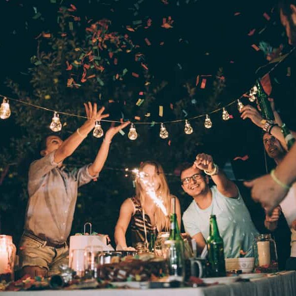 people celebrating in backyard at night