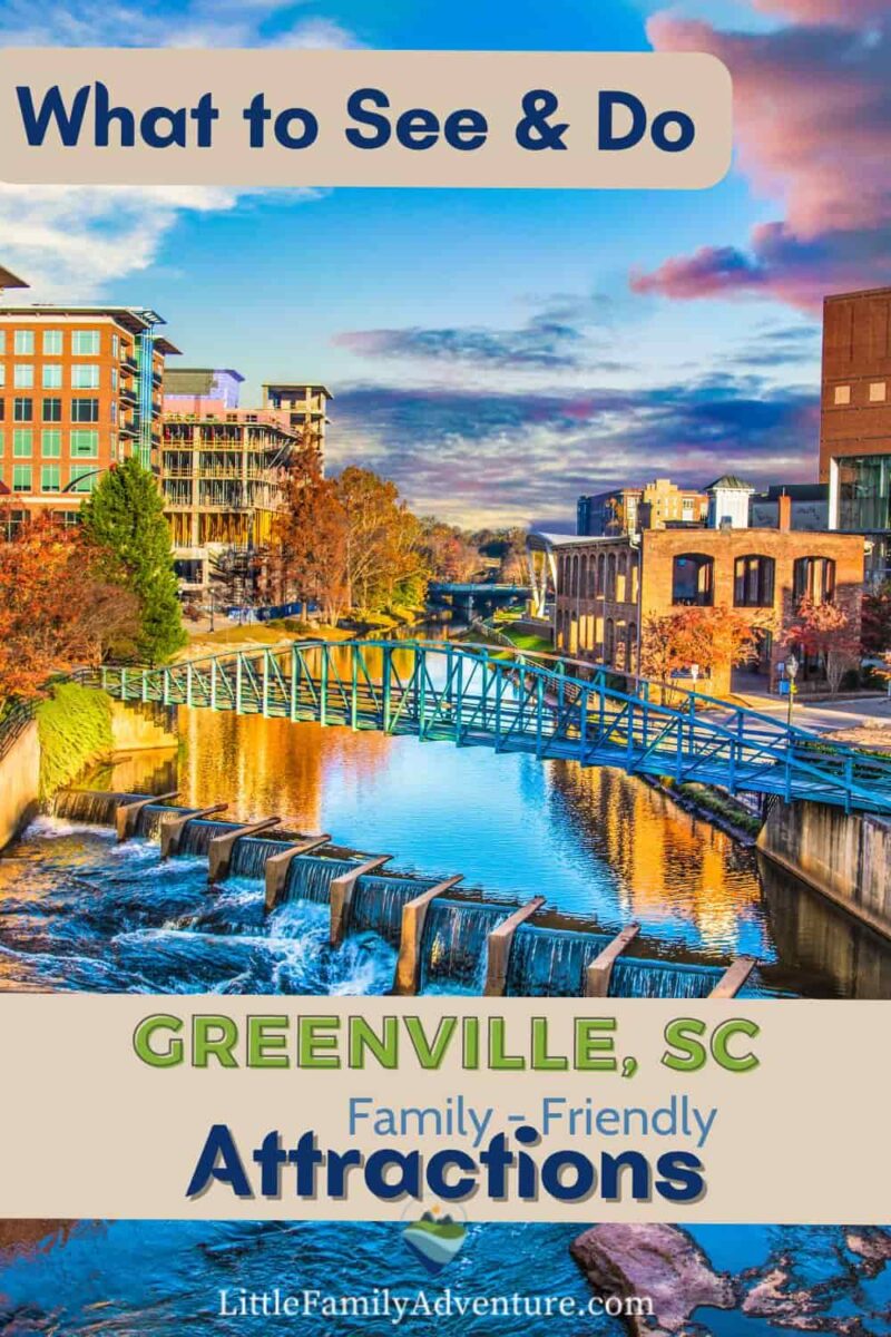 autumn city scene with bridge and river dam in downtown greenville sc