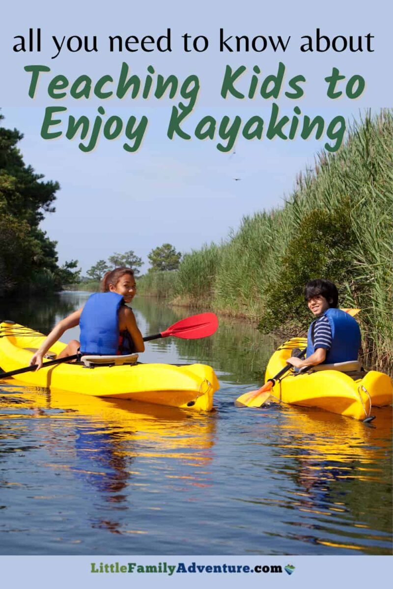 kids kayaking on marshy area