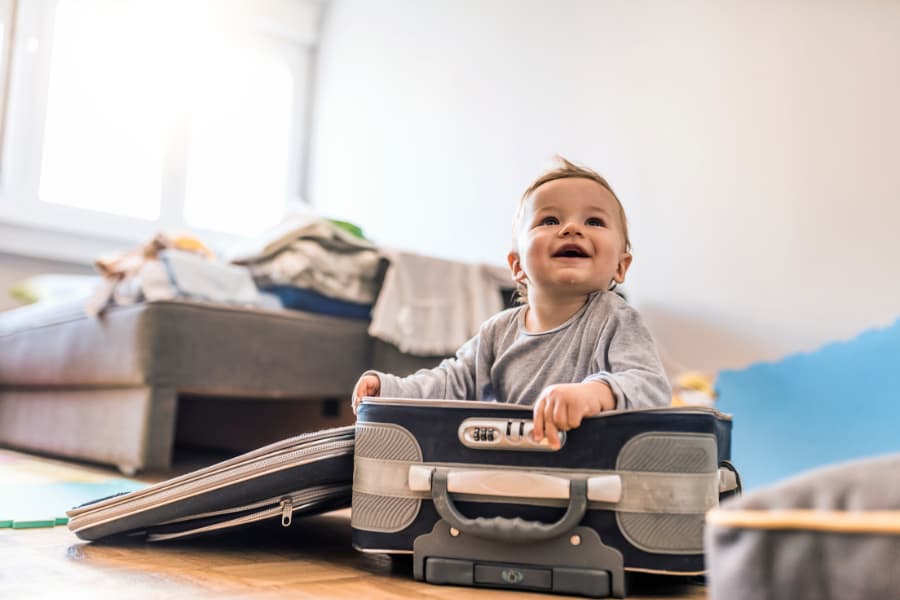 baby in suitcase