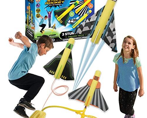 boy and girl jumping on stomp rocket airplanes