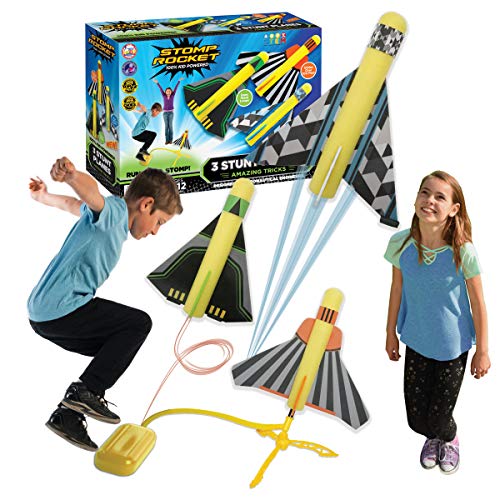 boy and girl jumping on stomp rocket airplanes