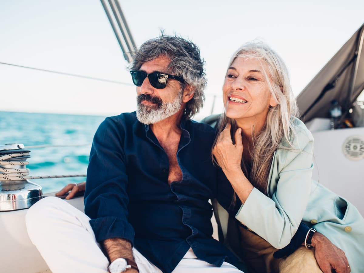 older adult couple on boat