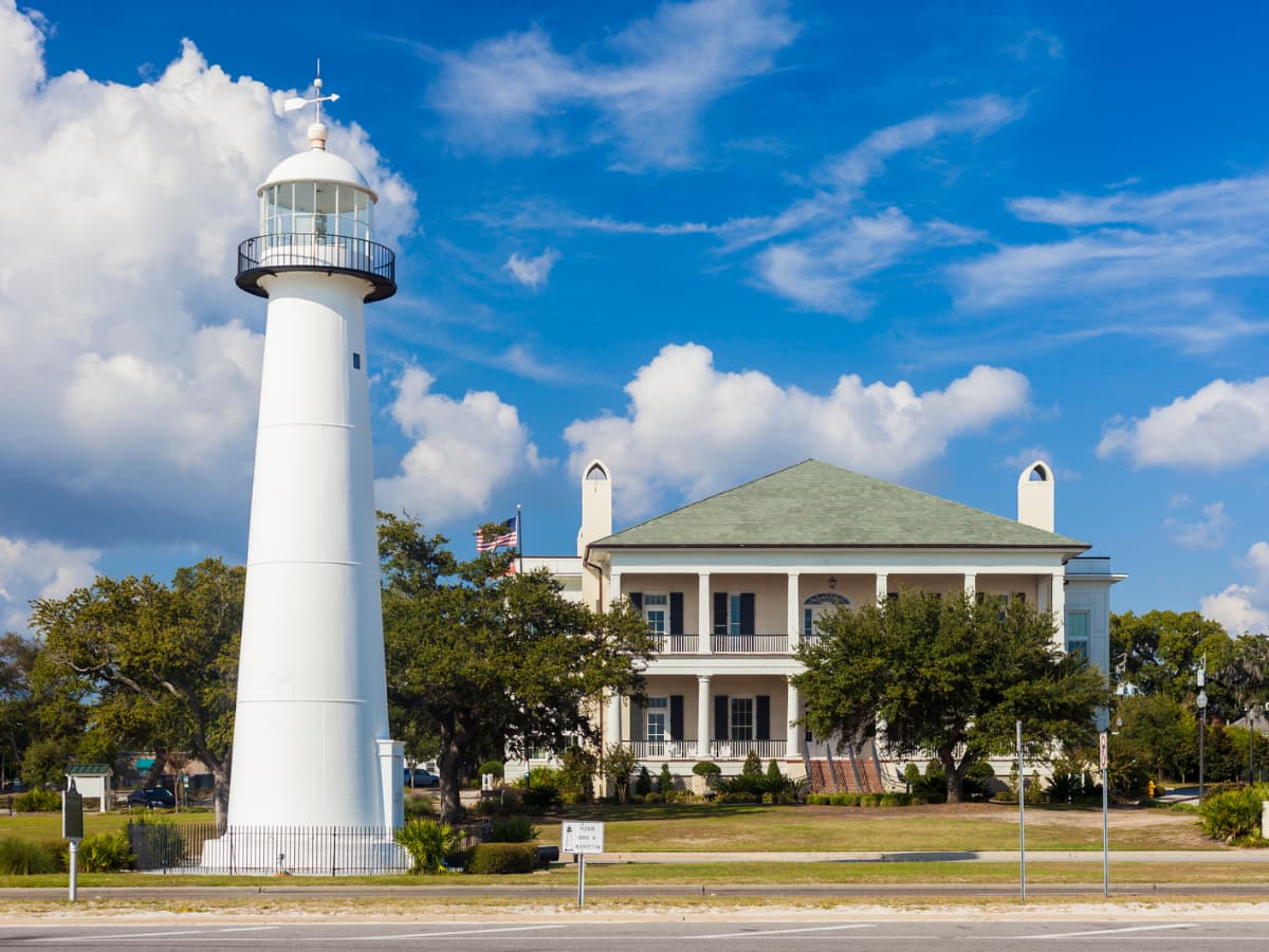 Biloxi Lighthouse in front of building