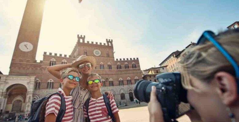 family taking pictures in Siena