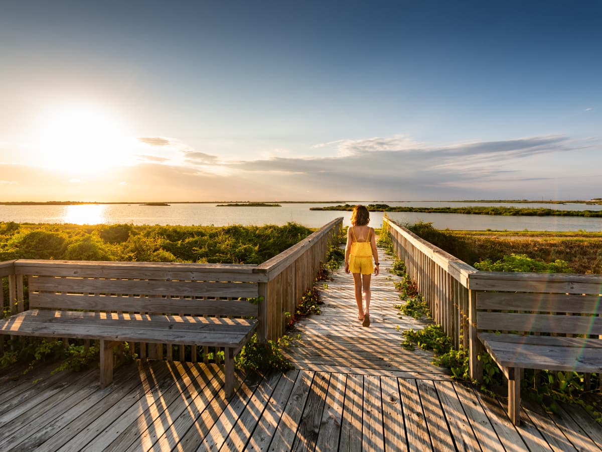 Child on boardwalk at Pea Island
