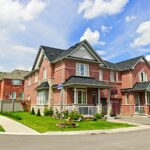 two story homes and sidewalk