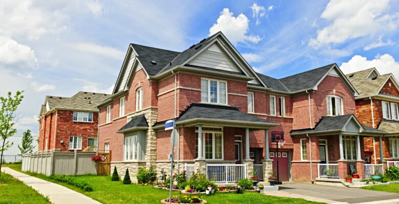 two story homes and sidewalk
