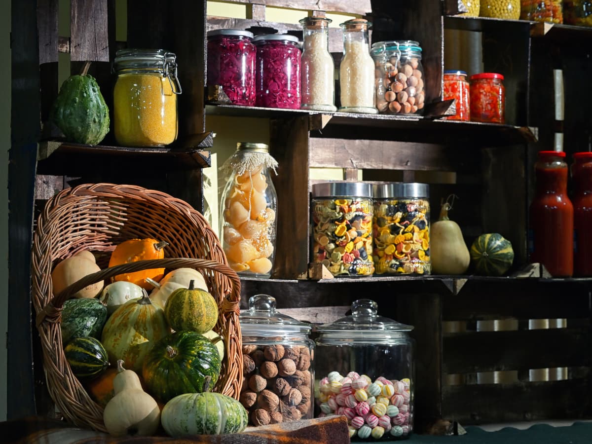 food storage cellar with baskets and cans of food