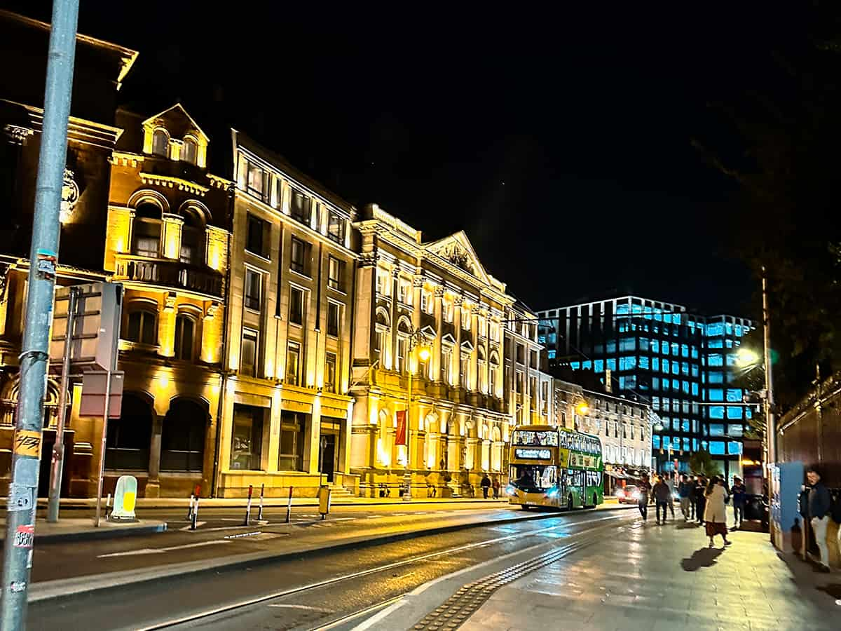 what to see in Dublin - cityscape at night with buildings and bus