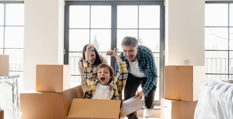family move with boy in a box