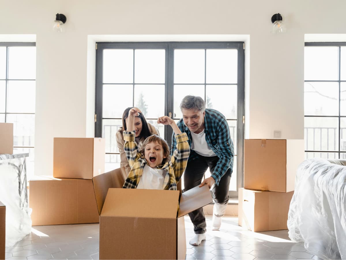 family move with boy in a box