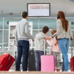 family packed for flight at airport