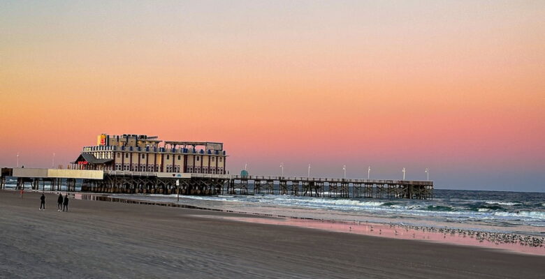Daytona Beach sunset with pier in background