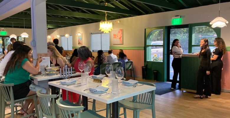 Kitchen Rumors restaurant interior with diners