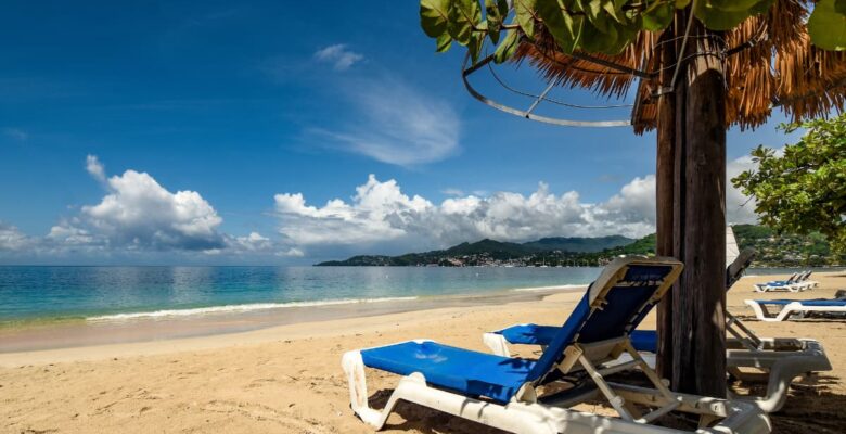 caribbean beach with shade and loungers