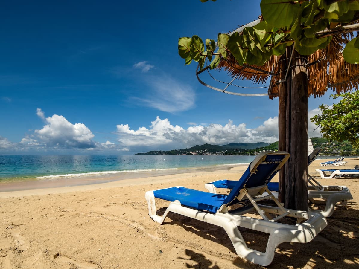 caribbean beach with shade and loungers