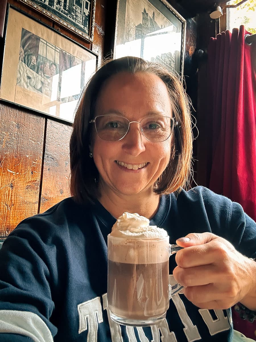 woman with mug of dutch hot chocolate