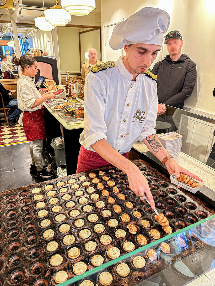 poffertje master making mini pancakes
