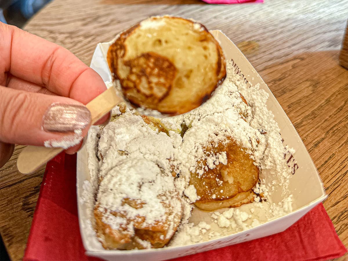 pofffertjes in tray and on toothpick